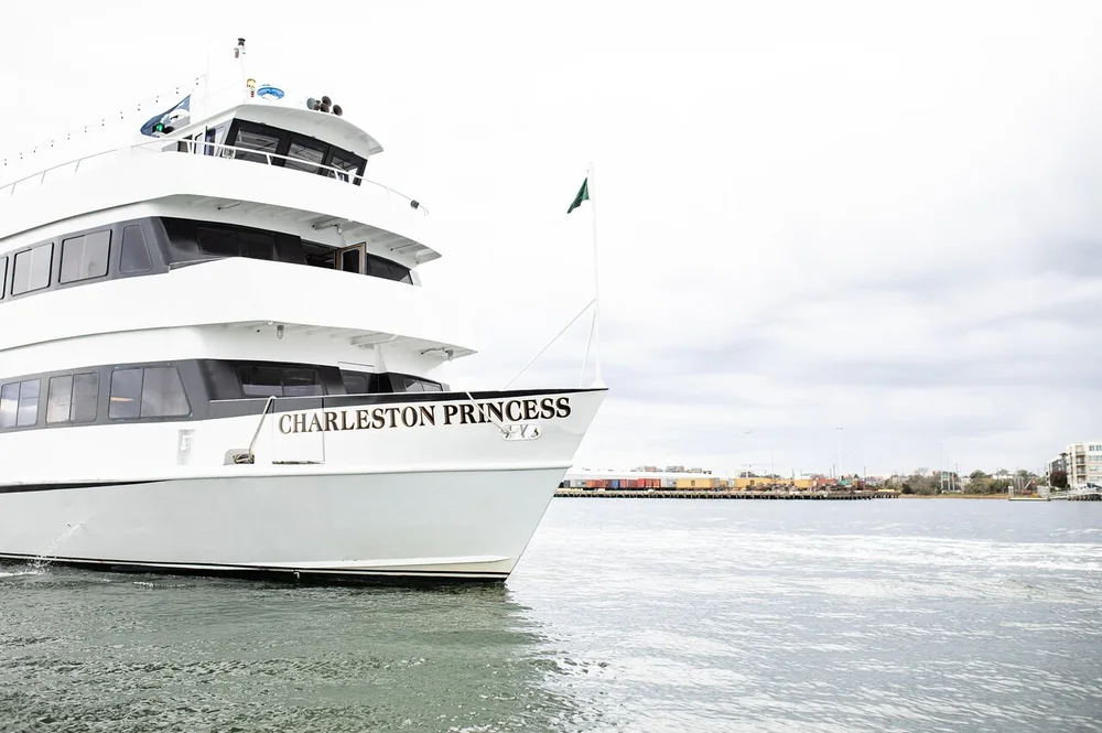 The white Charleston Princess cruise boat on the harbor